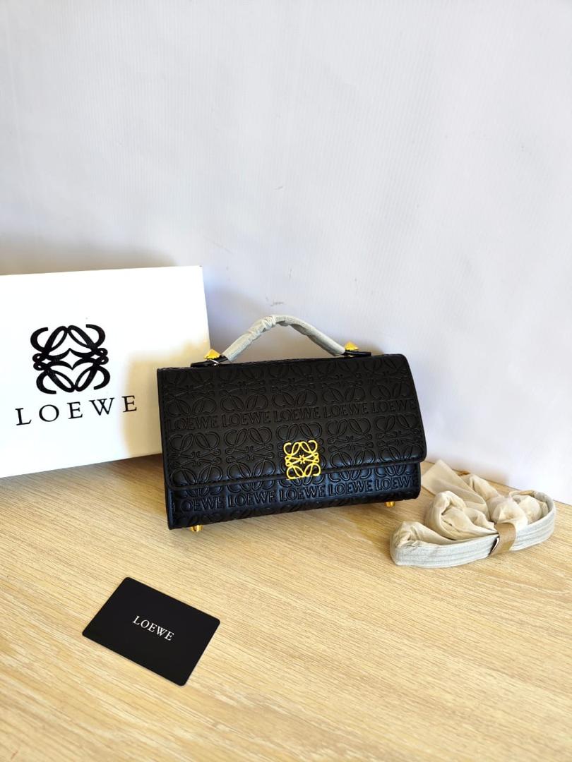 Guess Isola Monogram Embossed Top-Handle Crossbody Bag