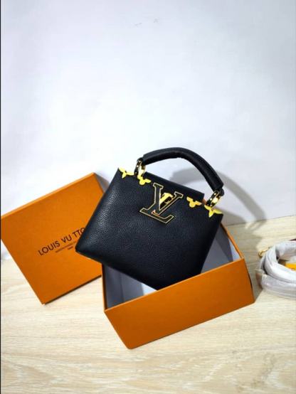 Louis Vuitton Capucines Handbag with Gold-Tone LV Clasp