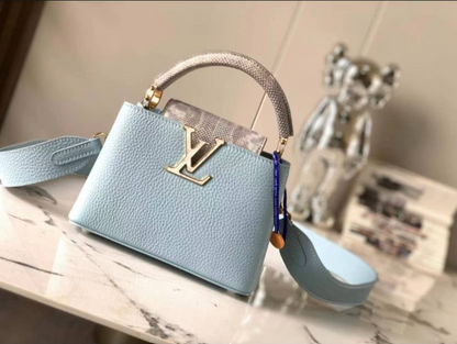 Louis Vuitton Capucines Handbag with Gold-Tone LV Clasp
