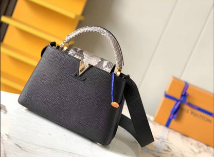 Louis Vuitton Capucines Handbag with Gold-Tone LV Clasp
