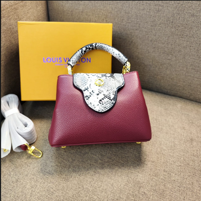 Louis Vuitton Capucines Handbag with Gold-Tone LV Clasp