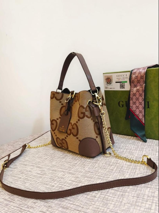 Gucci Neo Vintage GG Supreme Small Bucket Bag with Leather Trim
